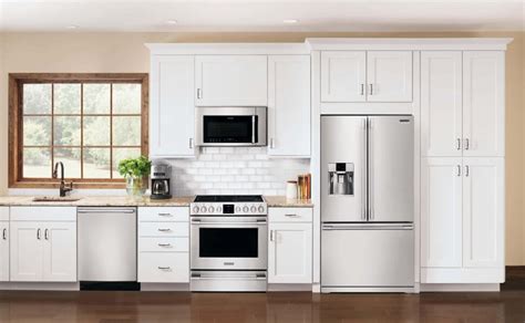 stainless steel appliances with wood cabinets|mixing white and stainless appliances.